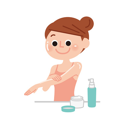 Woman applying moisturizing cream on body